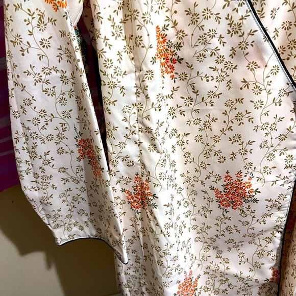 This a cute romper for new year. It’s like new - Picture 3 of 4